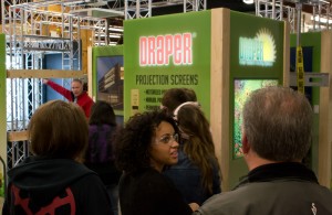 Graphic Design students see our designers' work on a trade show exhibit during AV Week