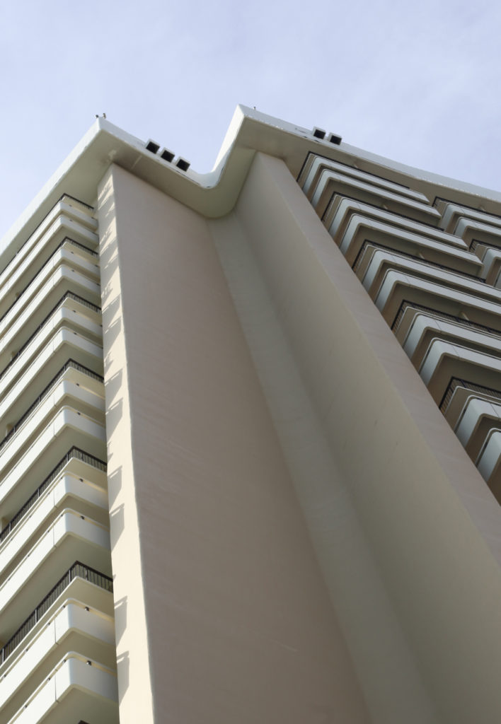 The openings for the projectors can just be made out high above the pool area.